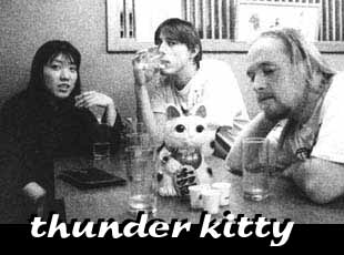 1 girl, 2 guys and a porcelain cat